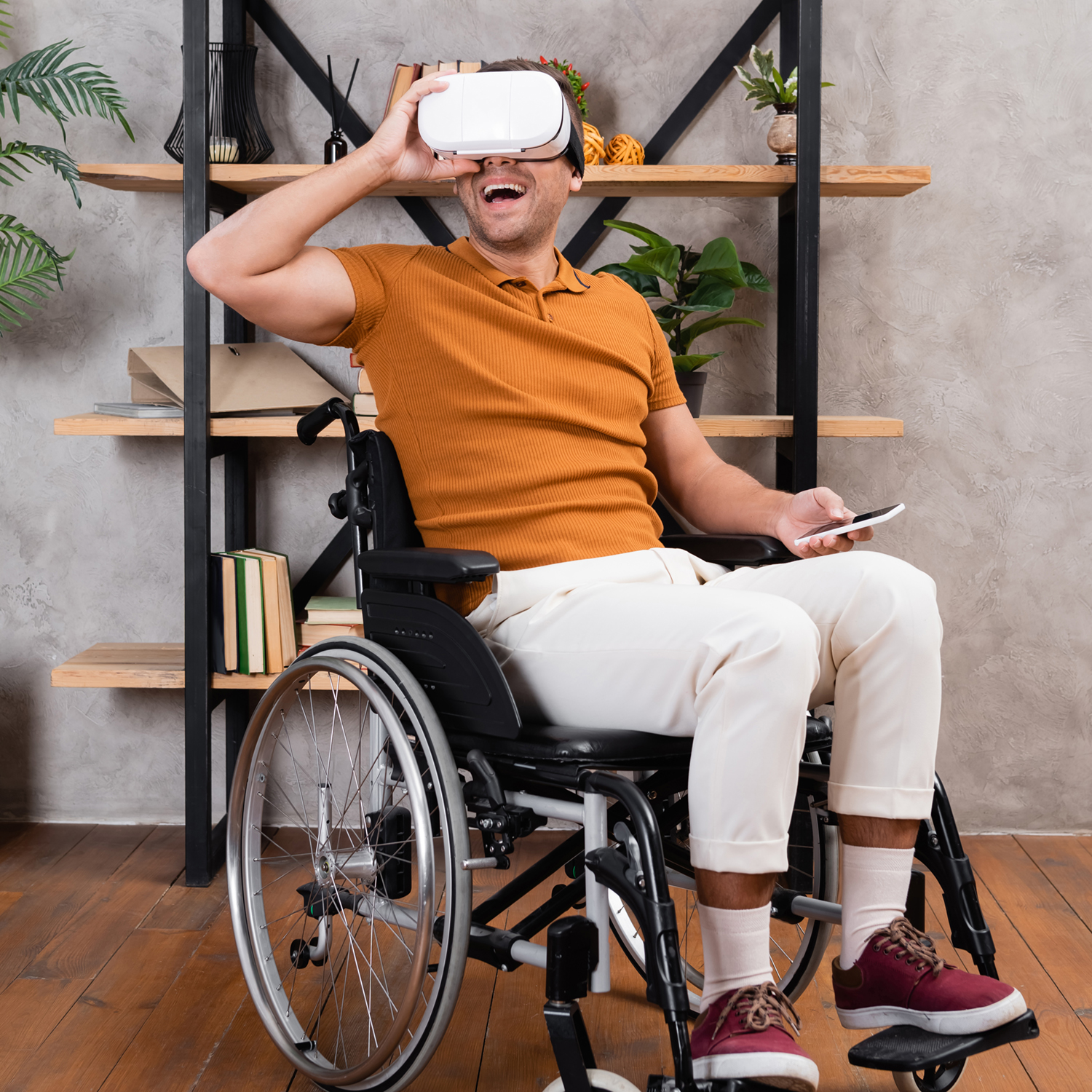 Excited,Man,Adjusting,Vr,Headset,While,Gaming,In,Wheelchair,At